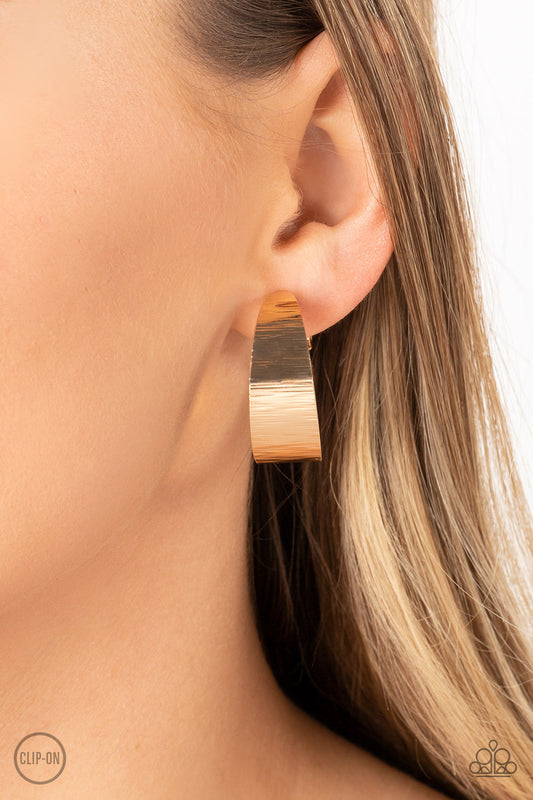 Versatile Velocity - Gold Clip - On Earrings - Paparazzi Accessories - Alies Bling Bar